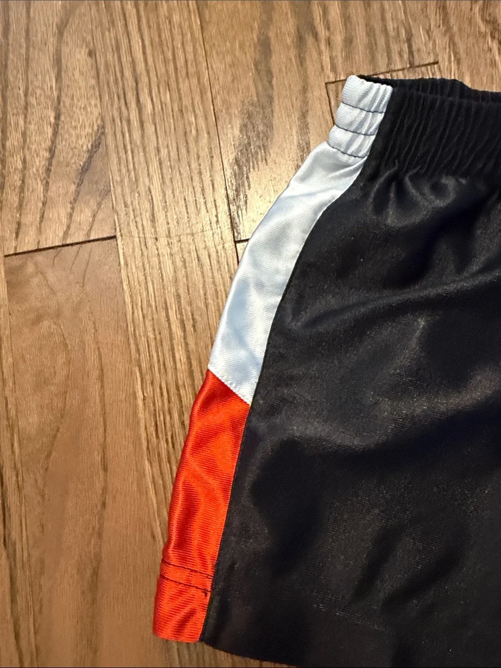 Toddler Boys Nike Kids Black Athletic Shorts with Orange & White Accents